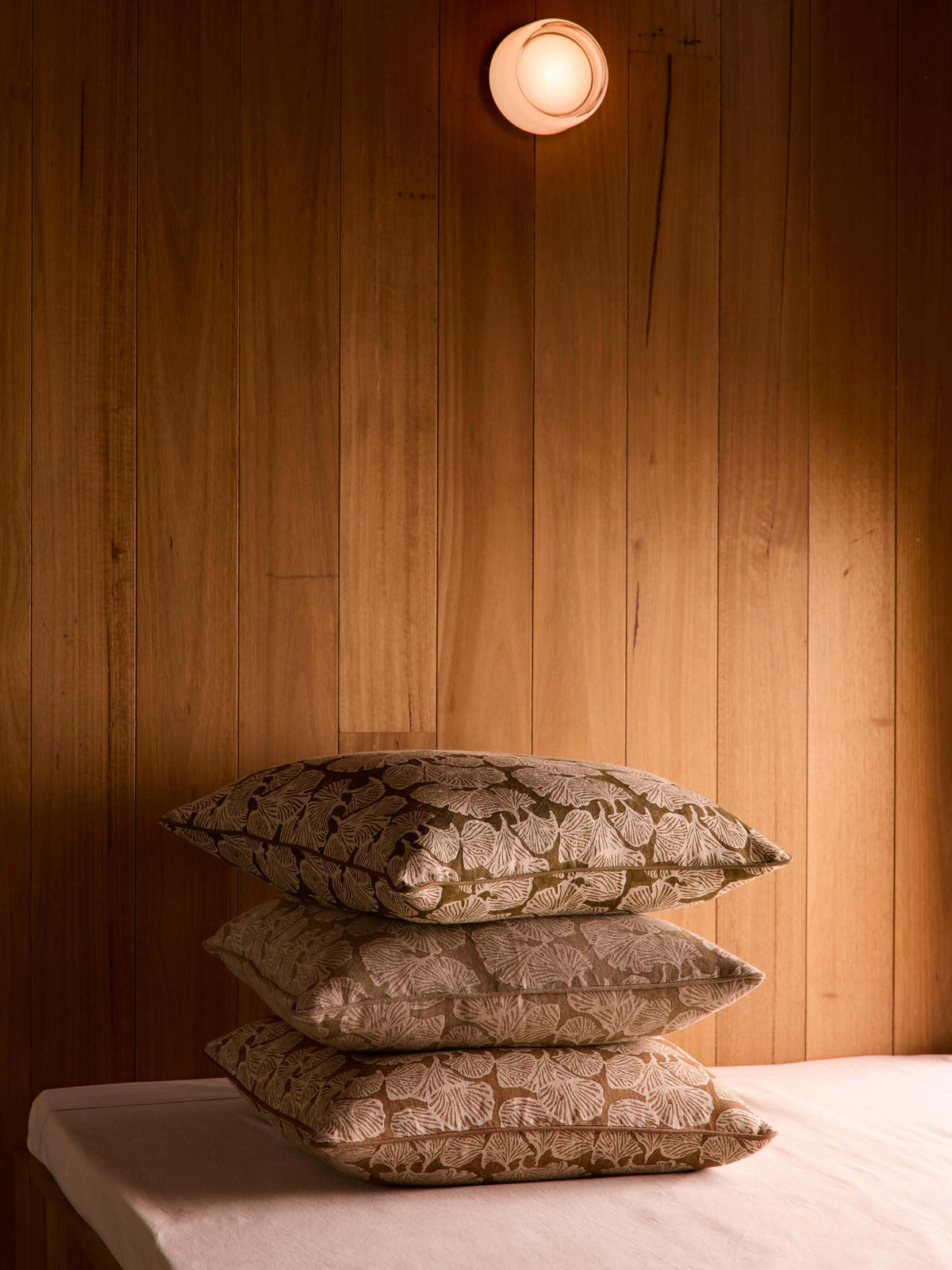 Ginkgo Khaki Square Cushion 50 x 50cm – studio front | Rodwell & Astor